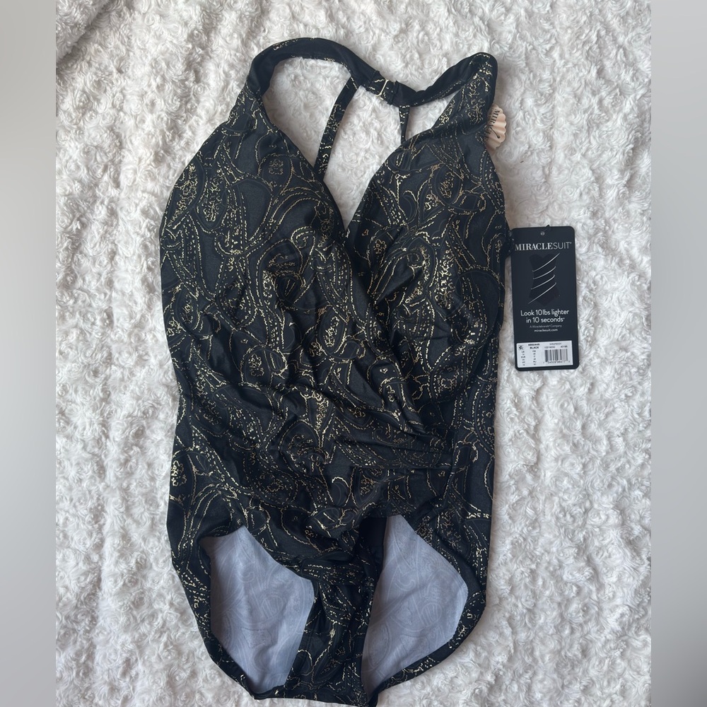 NWT—Wrapsody One-Piece in Sultana. Black with Gold Detailing. Size 14.